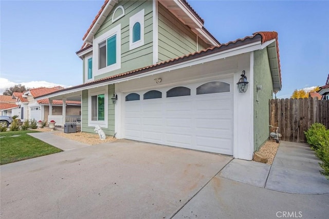 view of front of home with a garage