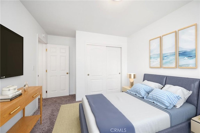 carpeted bedroom with a closet