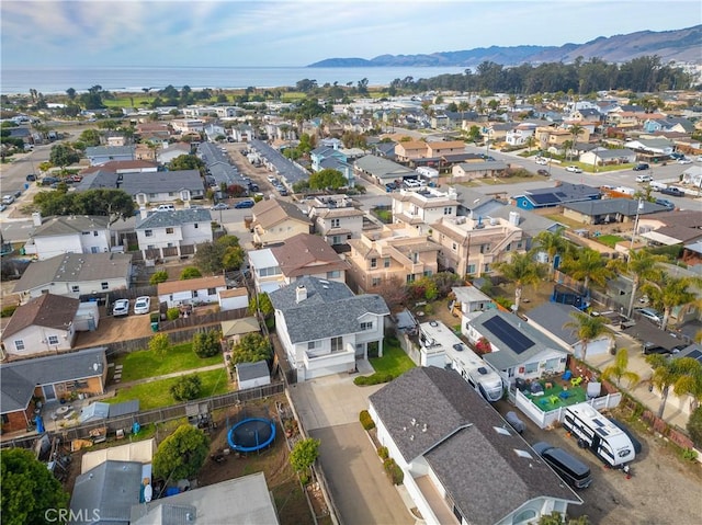 bird's eye view featuring a water and mountain view