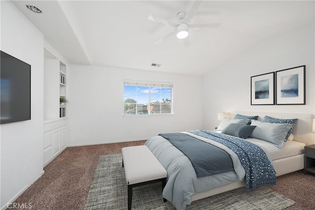 bedroom with ceiling fan and dark colored carpet