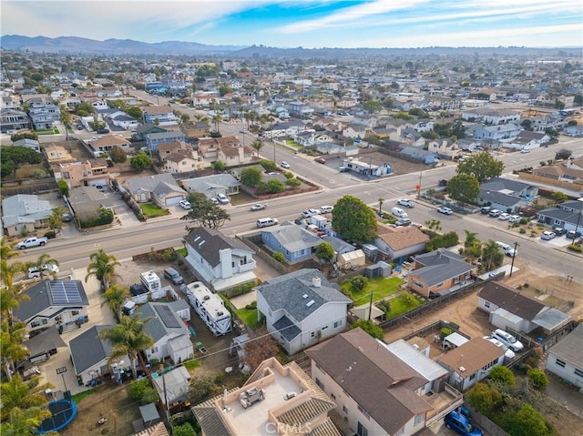 drone / aerial view featuring a mountain view