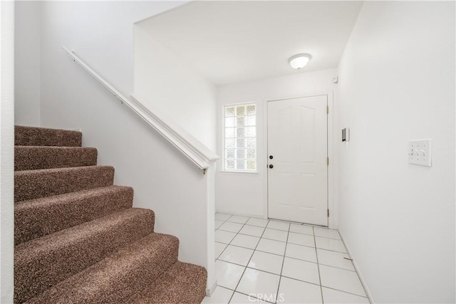 entrance foyer featuring light tile patterned floors