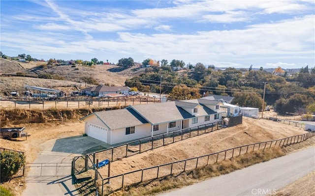 birds eye view of property featuring a rural view