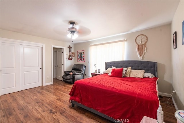 bedroom with ceiling fan and wood-type flooring