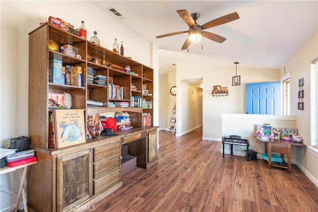 office space featuring lofted ceiling, ceiling fan, and dark hardwood / wood-style floors