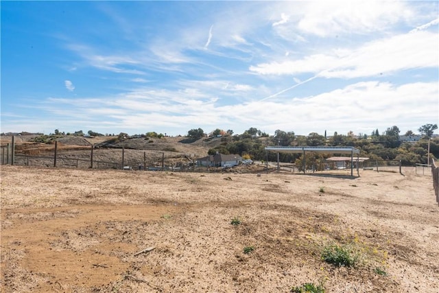 view of yard with a rural view