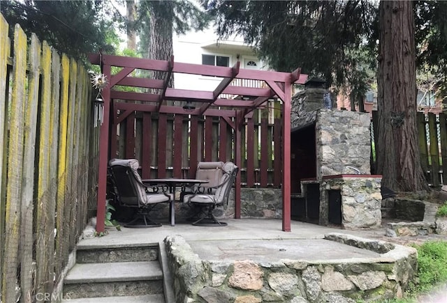 view of patio featuring a pergola