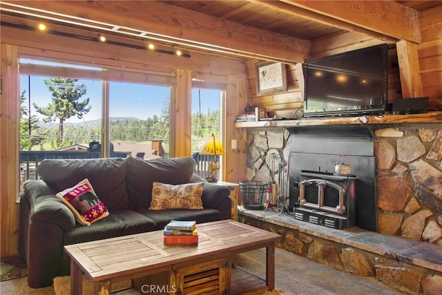 living room featuring beam ceiling and wood ceiling