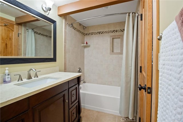 bathroom featuring tile patterned floors, vanity, and shower / bath combination with curtain