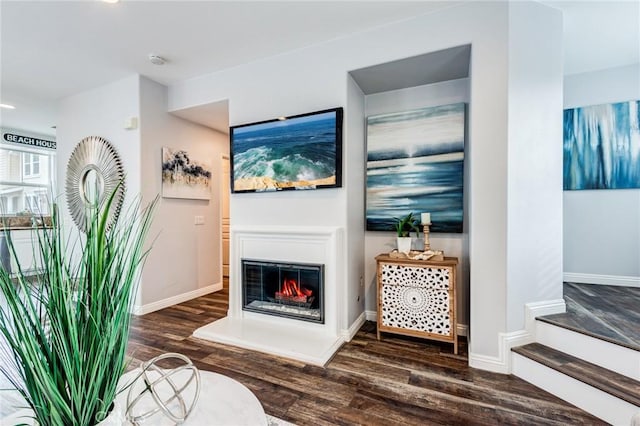 living room with dark wood-type flooring