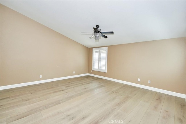 empty room featuring ceiling fan and light hardwood / wood-style flooring