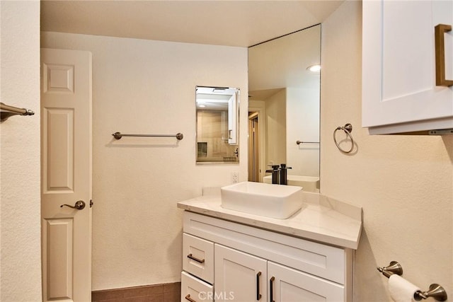 bathroom featuring vanity and tile patterned flooring