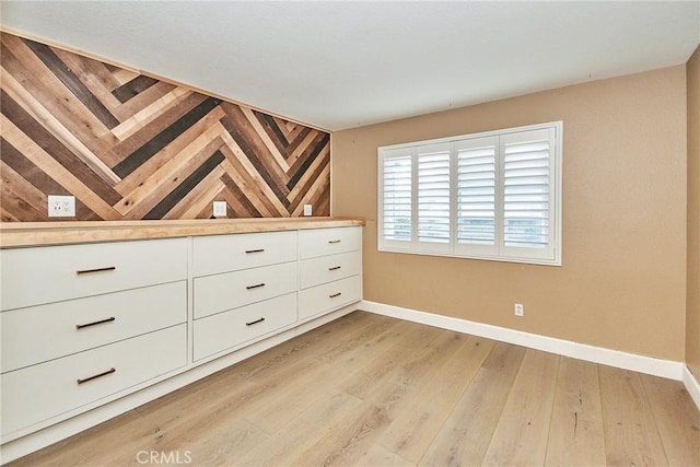 empty room with light wood-type flooring