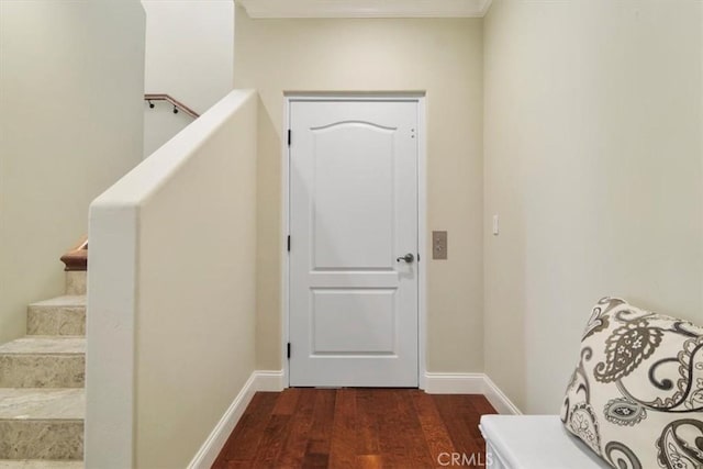 interior space with hardwood / wood-style floors and ornamental molding