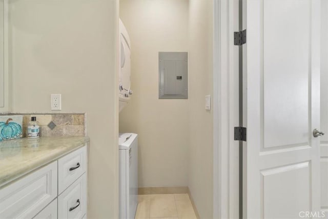 interior space featuring electric panel and light tile patterned floors