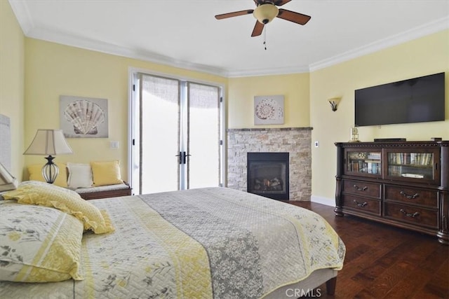 bedroom with crown molding, dark wood-type flooring, and ceiling fan