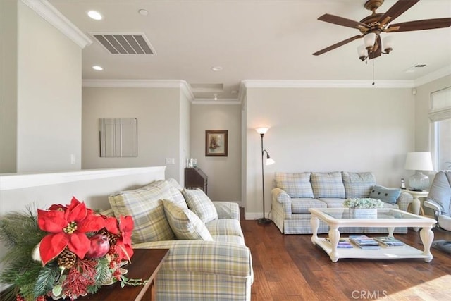 living room with dark hardwood / wood-style flooring, crown molding, and ceiling fan