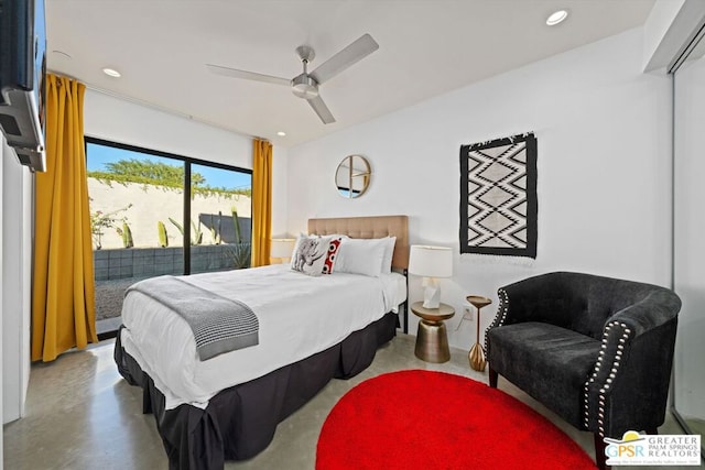 bedroom featuring ceiling fan, concrete flooring, and access to outside