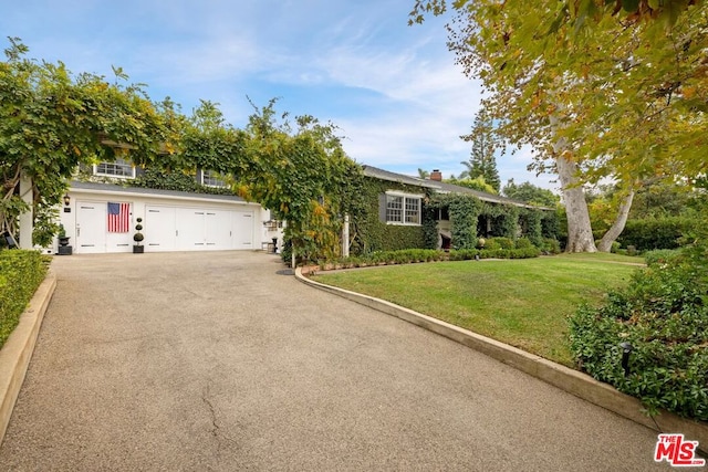 view of front of property with a front lawn