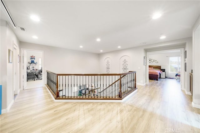 hall featuring light hardwood / wood-style floors