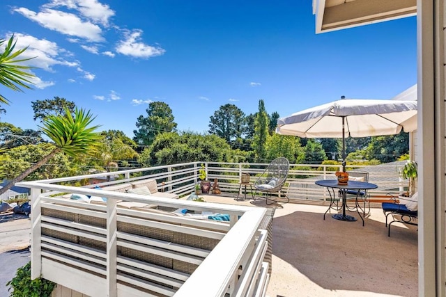 view of patio / terrace with a balcony