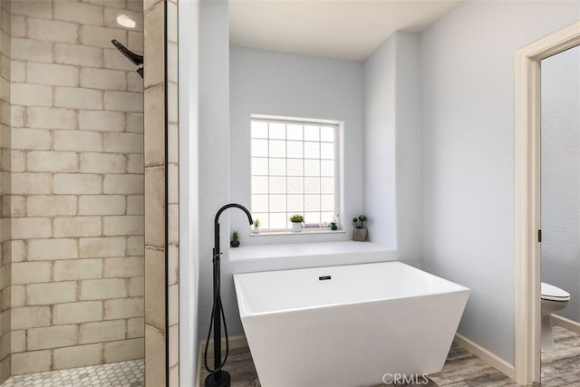 38752 Ruth Rd, Hemet, CA 92544 - bathroom featuring toilet, a shower stall, and a freestanding bath