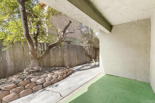 view of patio with fence