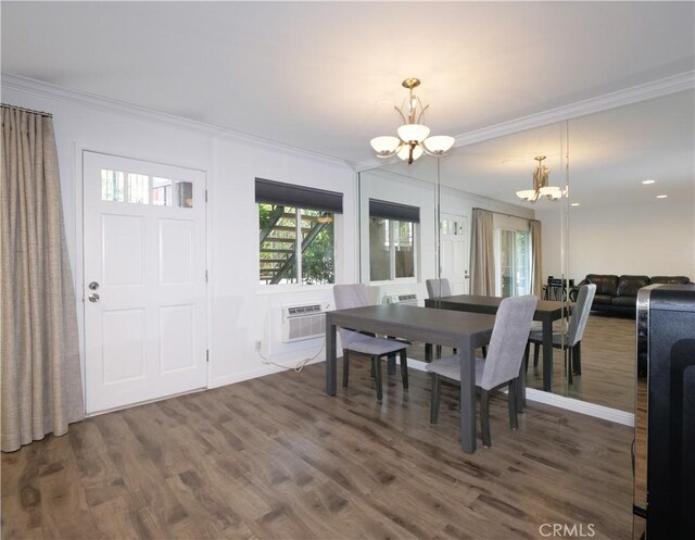 308 S Miraleste Dr Unit 57, San Pedro, CA 90732 - dining space with ornamental molding, dark wood-type flooring, a wall unit AC, and a chandelier