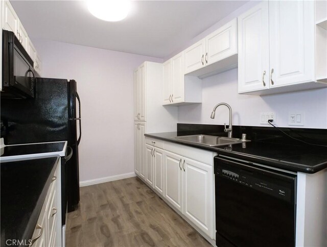 308 S Miraleste Dr Unit 57, San Pedro, CA 90732 - kitchen featuring white cabinets, sink, and black appliances