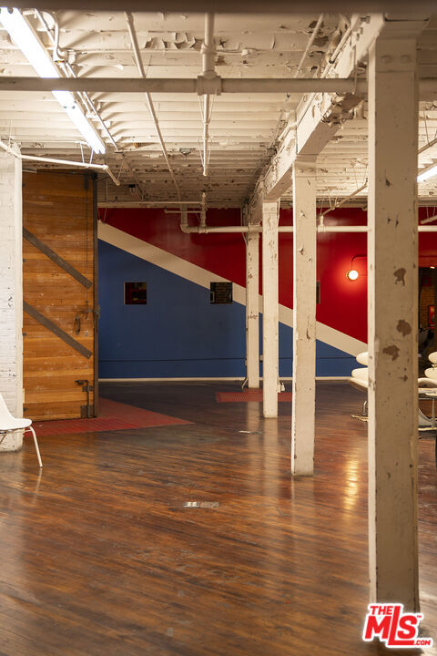 basement featuring dark hardwood / wood-style floors