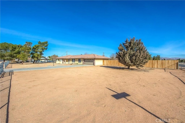 view of yard with a garage