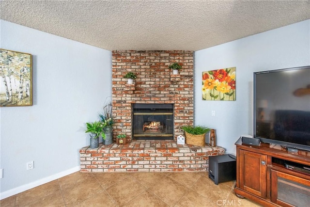 living room with light tile patterned flooring, a textured ceiling, and a fireplace