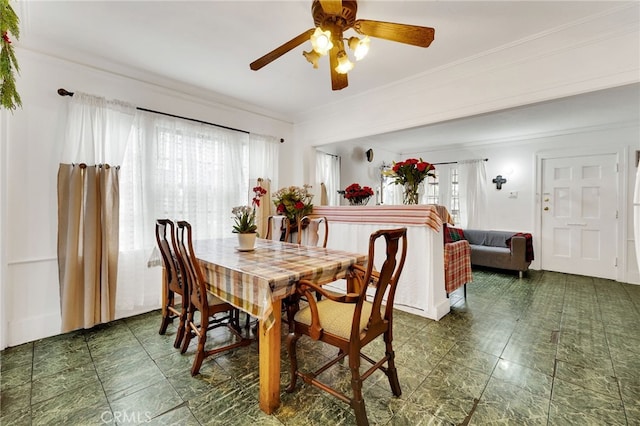 dining room with crown molding