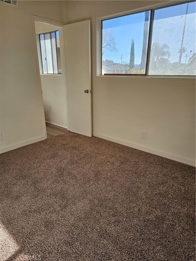 view of carpeted spare room