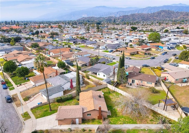 aerial view featuring a mountain view and a residential view