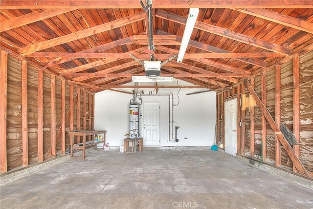 garage featuring secured water heater