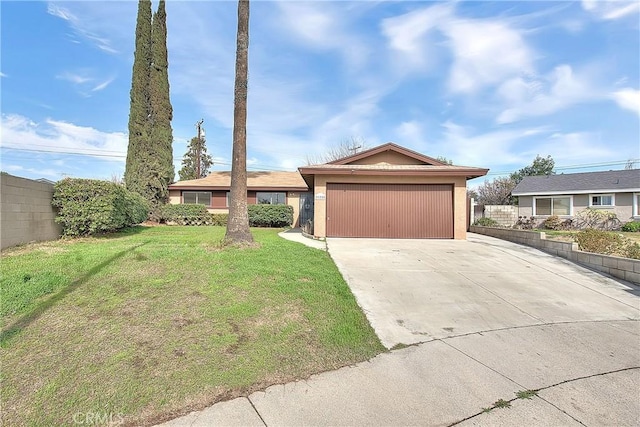 single story home with a front lawn, fence, stucco siding, driveway, and an attached garage