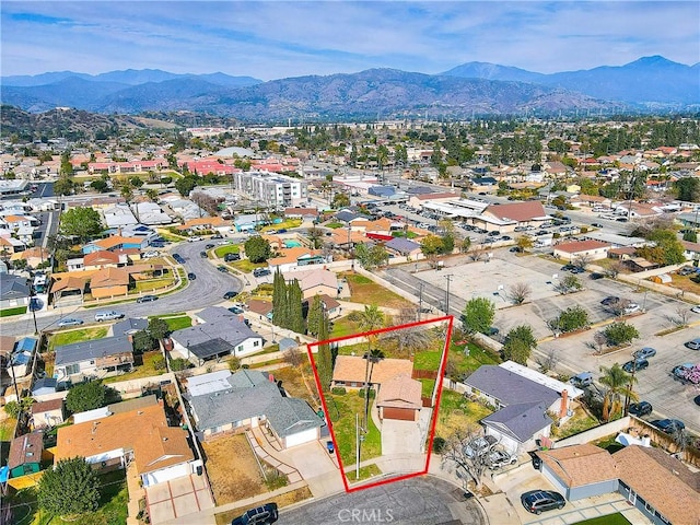 bird's eye view featuring a residential view and a mountain view