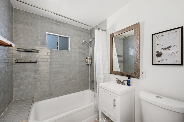 full bathroom with vanity, toilet, and shower / tub combo with curtain