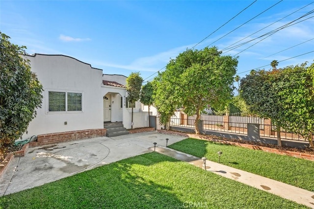 view of front of house with a front yard