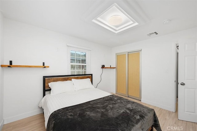 bedroom featuring light wood-type flooring