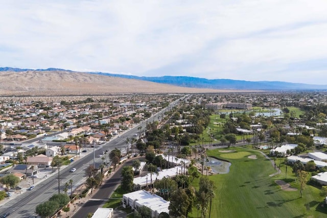 drone / aerial view with a water and mountain view