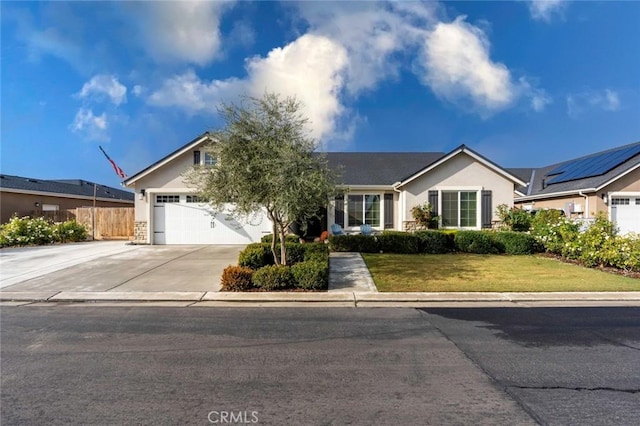 ranch-style house featuring a garage and a front lawn