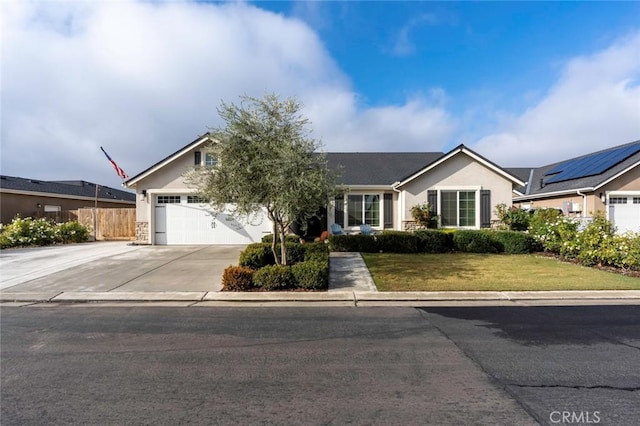 ranch-style home with a garage and a front yard