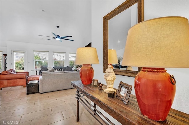 tiled living room featuring ceiling fan