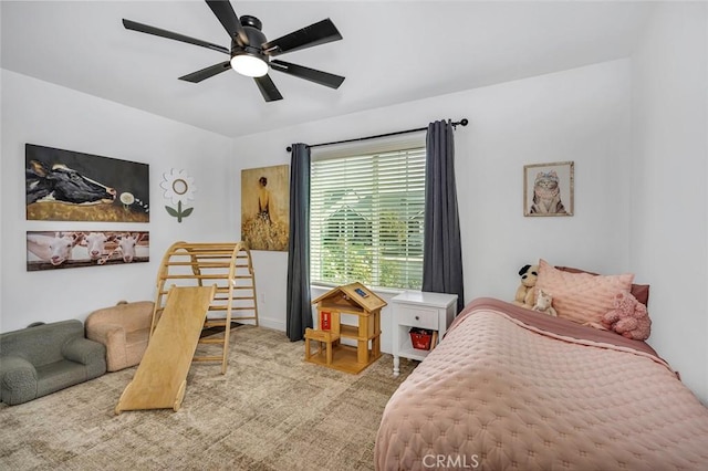 carpeted bedroom featuring ceiling fan