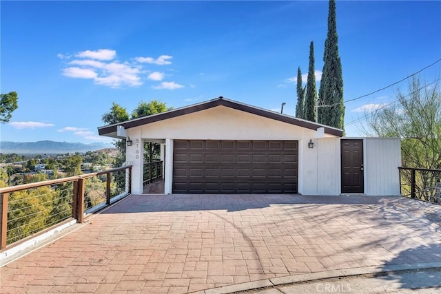 garage featuring a mountain view