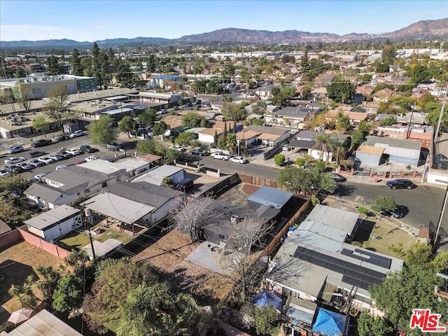 drone / aerial view featuring a mountain view