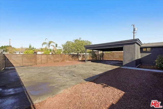 view of yard featuring a carport