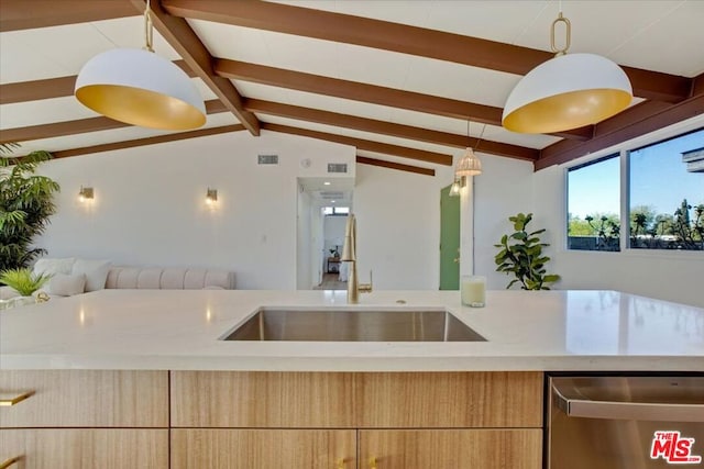 kitchen featuring light stone countertops, sink, decorative light fixtures, dishwasher, and vaulted ceiling with beams